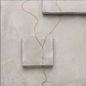 Anthropologie rose gold and black lariat necklace